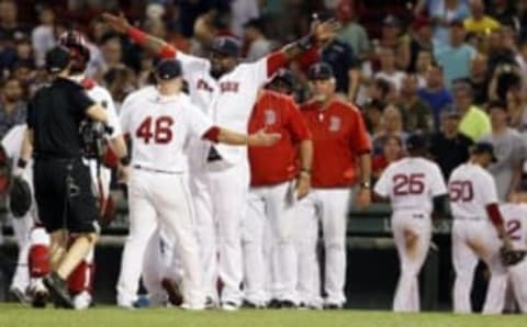 Jul 6, 2016; Boston, MA, USA; Boston Red Sox designated hitter David Ortiz (34) reacts with relief pitcher Craig Kimbrel (46) after defeating the Texas Rangers at Fenway Park. Mandatory Credit: David Butler II-USA TODAY Sports