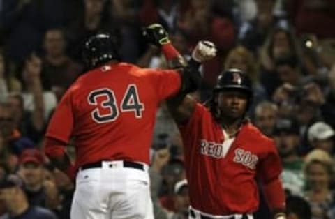 Jul 8, 2016; Boston, MA, USA; Boston Red Sox designated hitter David Ortiz (34) and first baseman Hanley Ramirez (13) celebrate after Ortiz