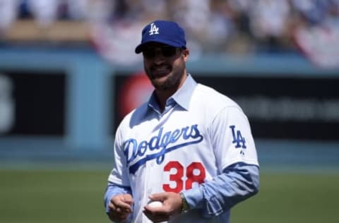 Apr 6, 2015; Los Angeles, CA, USA; Eric Gagne prepares to throw out the ceremonial first pitch before the 2015 MLB opening day game between the San Diego Padres and the Los Angeles Dodgers at Dodger Stadium. Mandatory Credit: Kirby Lee-USA TODAY Sports