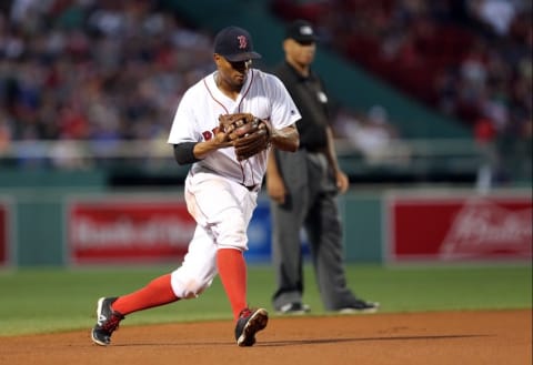 Jul 5, 2016; Boston, MA, USA; Boston Red Sox shortstop Xander Bogaerts (2) throws to first base against the Texas Rangers during the fourth inning at Fenway Park. Mandatory Credit: Mark L. Baer-USA TODAY Sports