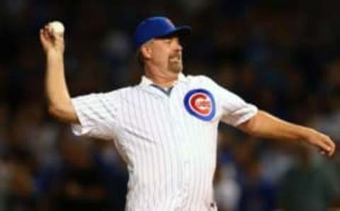 October 20, 2015; Chicago, IL, USA; Chicago Cubs former player Rick Sutcliffe throws out the first pitch before the Cubs play against the New York Mets in game four of the NLCS at Wrigley Field. Mandatory Credit: Jerry Lai-USA TODAY Sports