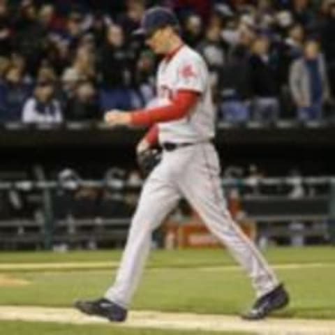 May 5, 2016; Chicago, IL, USA; Boston Red Sox starting pitcher Henry Owens (60) walks towards the dugout after being relieved against the Chicago White Sox during the fourth inning at U.S. Cellular Field. Mandatory Credit: Kamil Krzaczynski-USA TODAY Sports