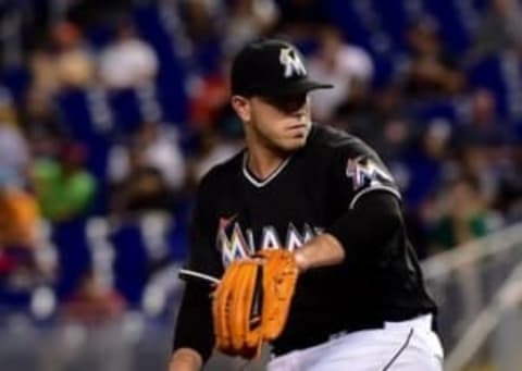 Jul 28, 2016; Miami, FL, USA; Miami Marlins starting pitcher Jose Fernandez (16) delivers a pitch during the first inning against the St. Louis Cardinals at Marlins Park. Mandatory Credit: Steve Mitchell-USA TODAY Sports