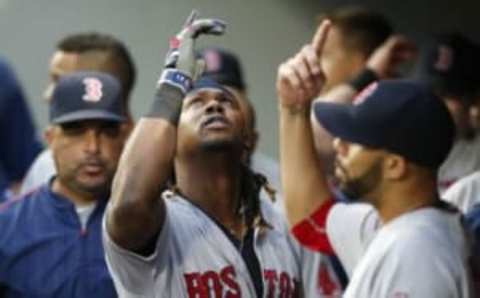 Aug 2, 2016; Seattle, WA, USA; Boston Red Sox first baseman Hanley Ramirez (13) celebrates in the dugout after hitting a solo-home run at Safeco Field. Mandatory Credit: Joe Nicholson-USA TODAY Sports