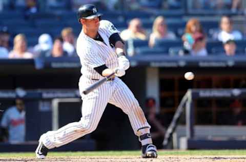 Aug 28, 2016; Bronx, NY, USA; New York Yankees designated hitter Gary Sanchez (24) hits a double against the Baltimore Orioles during the eighth inning at Yankee Stadium. Mandatory Credit: Brad Penner-USA TODAY Sports