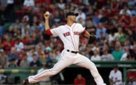 Aug 29, 2016; Boston, MA, USA; Boston Red Sox starting pitcher Rick Porcello (22) pitches against the Tampa Bay Rays during the first inning at Fenway Park. Mandatory Credit: Mark L. Baer-USA TODAY Sports