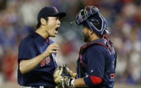 (EDITORS NOTE: caption corection) Jun 24, 2016; Arlington, TX, USA; Boston Red Sox relief pitcher Koji Uehara (19) and catcher Sandy Leon (3) celebrate after their team