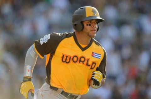 Jul 10, 2016; San Diego, CA, USA; World infielder Yoan Moncada hits a two-run home run in the 7th inning during the All Star Game futures baseball game at PetCo Park. Mandatory Credit: Gary A. Vasquez-USA TODAY Sports