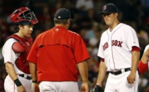 Sep 13, 2016; Boston, MA, USA; As Boston Red Sox catcher Ryan Hanigan (10) looks on, Boston Red Sox manager John Farrell (53) comes out to remove Boston Red Sox starting pitcher Drew Pomeranz (31) from the game at Fenway Park. Mandatory Credit: Winslow Townson-USA TODAY Sports