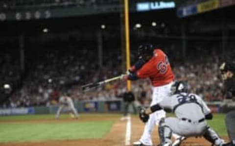 Sep 16, 2016; Boston, MA, USA; Boston Red Sox designated hitter David Ortiz (34) hits an RBI single against the New York Yankees at Fenway Park. Mandatory Credit: Bob DeChiara-USA TODAY Sports