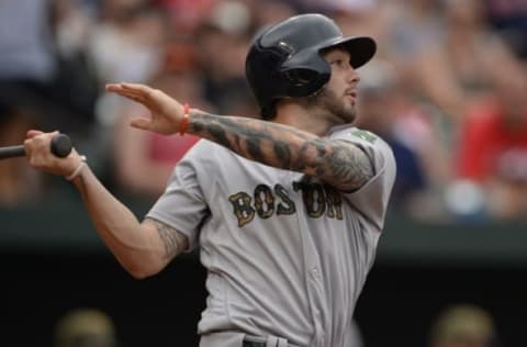 May 30, 2016; Baltimore, MD, USA; Boston Red Sox left fielder Blake Swihart (23) triples during the sixth inning against the Baltimore Orioles at Oriole Park at Camden Yards. The Red Sox won 7-2. Mandatory Credit: Tommy Gilligan-USA TODAY Sports