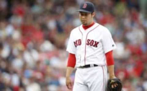 Aug 31, 2016; Boston, MA, USA; Boston Red Sox pitcher Junichi Tazawa (36) reacts after giving up two runs at Fenway Park. Mandatory Credit: Greg M. Cooper-USA TODAY Sports