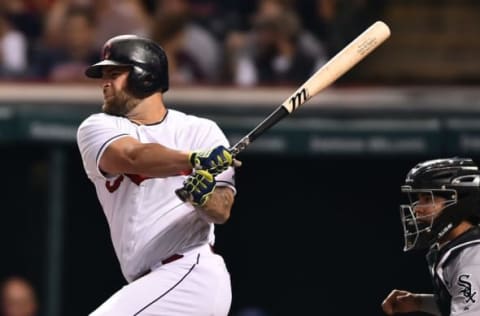 Sep 23, 2016; Cleveland, OH, USA; Cleveland Indians first baseman Mike Napoli (26) hits an RBI single during the fifth inning against the Chicago White Sox at Progressive Field. Mandatory Credit: Ken Blaze-USA TODAY Sports