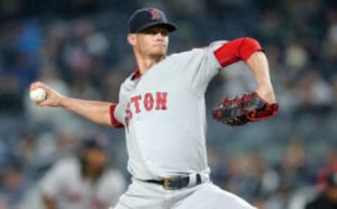 Sep 28, 2016; Bronx, NY, USA; Boston Red Sox starting pitcher Clay Buchholz (11) pitches against the New York Yankees during the first inning at Yankee Stadium. Mandatory Credit: Brad Penner-USA TODAY Sports