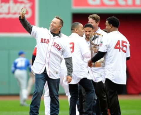 Oct 2, 2016; Boston, MA, USA; Boston Red Sox former player Kevin Millar takes a selfie during pregame ceremonies in honor of designated hitter David Ortiz (34) before a game against the Toronto Blue Jays at Fenway Park. Mandatory Credit: Bob DeChiara-USA TODAY Sports