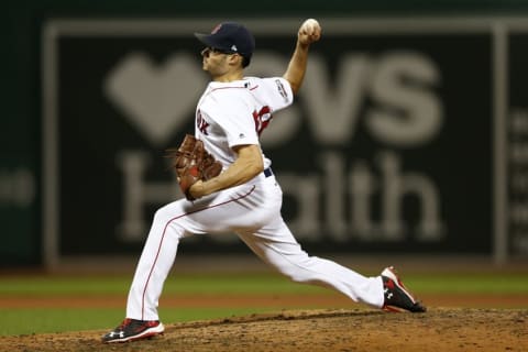 Oct 10, 2016; Boston, MA, USA; Boston Red Sox relief pitcher Joe Kelly (56) delivers a pitch in the sixth inning against the Cleveland Indians during game three of the 2016 ALDS playoff baseball series at Fenway Park. Mandatory Credit: Greg M. Cooper-USA TODAY Sports