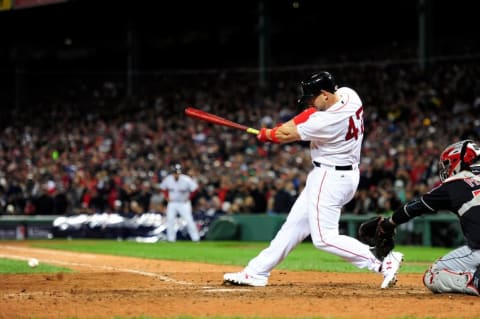 Oct 10, 2016; Boston, MA, USA; Boston Red Sox third baseman Travis Shaw (47) singles in the eighth inning against the Cleveland Indians during game three of the 2016 ALDS playoff baseball series at Fenway Park. Mandatory Credit: Bob DeChiara-USA TODAY Sports