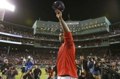 Oct 10, 2016; Boston, MA, USA; Boston Red Sox designated hitter David Ortiz (34) salutes the fans after loosing to the Cleveland Indians 3-4 in game three of the 2016 ALDS playoff baseball series at Fenway Park. Mandatory Credit: Greg M. Cooper-USA TODAY Sports