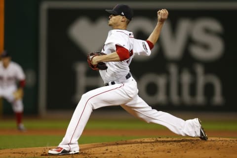 Oct 10, 2016; Boston, MA, USA; Boston Red Sox starting pitcher Clay Buchholz (11) delivers a pitch in the first inning against the Cleveland Indians during game three of the 2016 ALDS playoff baseball series at Fenway Park. Mandatory Credit: Greg M. Cooper-USA TODAY Sports