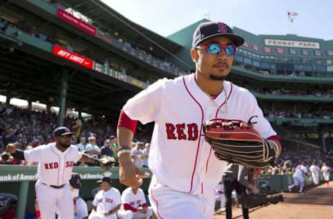 Sep 17, 2016; Boston, MA, USA; Boston Red Sox right fielder Mookie Betts (50) takes the field before their game against the New York Yankees at Fenway Park. Mandatory Credit: Winslow Townson-USA TODAY Sports