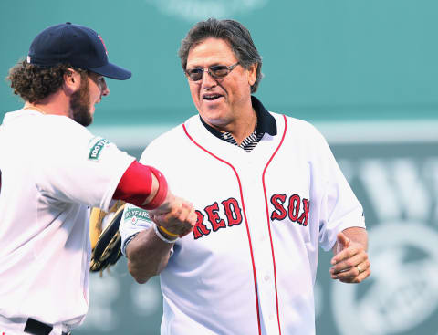 BOSTON, MA – MAY 26: Jarrod Saltalamacchia #39 of the Boston Red Sox shakes hands with Hall of Famer and former Red Sox catcher Carlton Fisk, after Fisk threw out the ceremonial first pitch before a game against the Tampa Bay Rays at Fenway Park on May 26, 2012 in Boston, Massachusetts. (Photo by Gail Oskin/Getty Images)