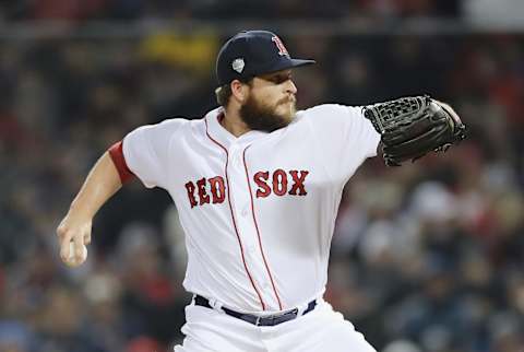 BOSTON, MA – OCTOBER 23: Ryan Brasier #70 of the Boston Red Sox delivers the pitch during the seventh inning against the Los Angeles Dodgers in Game One of the 2018 World Series at Fenway Park on October 23, 2018 in Boston, Massachusetts. (Photo by Elsa/Getty Images)