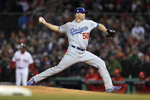 BOSTON, MA – OCTOBER 24: Ryan Madson #50 of the Los Angeles Dodgers delivers the pitch during the fifth inning against the Boston Red Sox in Game Two of the 2018 World Series at Fenway Park on October 24, 2018 in Boston, Massachusetts. (Photo by Elsa/Getty Images)