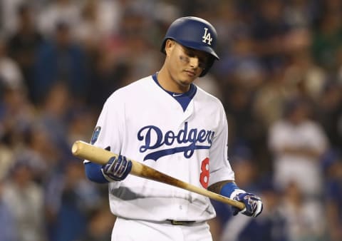 LOS ANGELES, CA – OCTOBER 26: Manny Machado #8 of the Los Angeles Dodgers reacts after flying out during the thirteenth inning against the Boston Red Sox in Game Three of the 2018 World Series at Dodger Stadium on October 26, 2018 in Los Angeles, California. (Photo by Ezra Shaw/Getty Images)