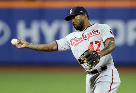 NEW YORK, NEW YORK – MAY 20: Howie Kendrick #47 of the Washington Nationals fields a hit by Juan Lagares of the New York Mets in the eighth inning at Citi Field on May 20, 2019 in the Flushing neighborhood of the Queens borough of New York City. (Photo by Elsa/Getty Images)