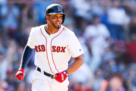 BOSTON, MA – JUNE 26: Xander Bogaerts #2 of the Boston Red Sox runs to first base after hitting a two-run RBI-single to take the lead in the eighth inning of a game against the Chicago White Sox at Fenway Park on June 26, 2019 in Boston, Massachusetts. (Photo by Adam Glanzman/Getty Images)