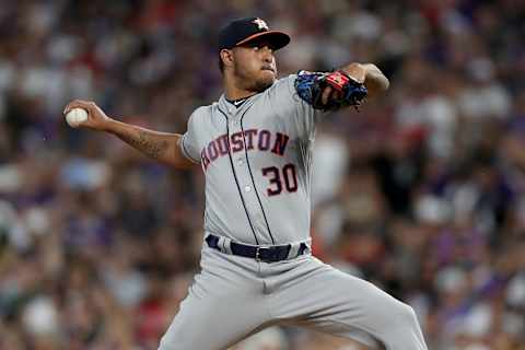 DENVER, COLORADO – JULY 03: Pitcher Hector Rondon #30 of the Houston Astros throws in the eighth inning against the Colorado Rockies at Coors Field on July 03, 2019 in Denver, Colorado. (Photo by Matthew Stockman/Getty Images)