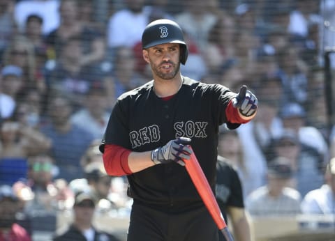 SAN DIEGO, CA – AUGUST 25: J.D. Martinez #28 of the Boston Red Sox reacts after striking out during the eighth inning of a baseball game against the San Diego Padres at Petco Park August 25, 2019 in San Diego, California. Teams are wearing special color schemed uniforms with players choosing nicknames to display for Players’ Weekend. (Photo by Denis Poroy/Getty Images)