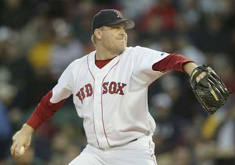 Boston Red Sox pitcher Curt Schilling throws against the Oakland Athletics, Tuesday, May 25, 2004, at Fenway Park in Boston. (Photo by J Rogash/Getty Images)