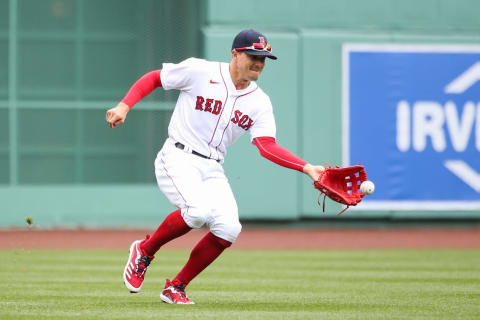 BOSTON, MA – APRIL 7: Kiké Hernandez #5 of the Boston Red Sox fields a ball in the third inning against the Tampa Bay Rays at Fenway Park on April 7, 2021 in Boston, Massachusetts. (Photo by Kathryn Riley/Getty Images)