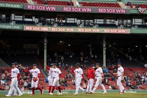 BOSTON, MA – APRIL 7: Members of the Boston Red Sox celebrate a victory against the Tampa Bay Rays on April 7, 2021 at Fenway Park in Boston, Massachusetts. (Photo by Billie Weiss/Boston Red Sox/Getty Images)