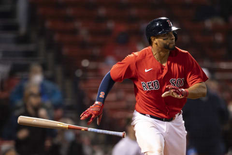 BOSTON, MA – APRIL 23: Xander Bogaerts #2 of the Boston Red Sox hits an RBI single during the fifth inning of a game against the Seattle Mariners on April 23, 2021 at Fenway Park in Boston, Massachusetts. (Photo by Billie Weiss/Boston Red Sox/Getty Images)