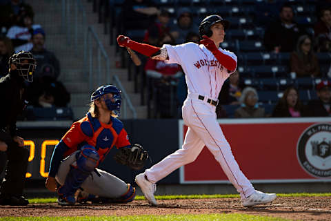 BOSTON, MA – MAY 11: Jarren Duran #24 of the Worcester Red Sox hits a solo home run during the seventh inning of the inaugural game at Polar Park against the Syracuse Mets on May 11, 2021 in Worcester, Massachusetts. It was the first game ever played at Polar Park. (Photo by Billie Weiss/Boston Red Sox/Getty Images)