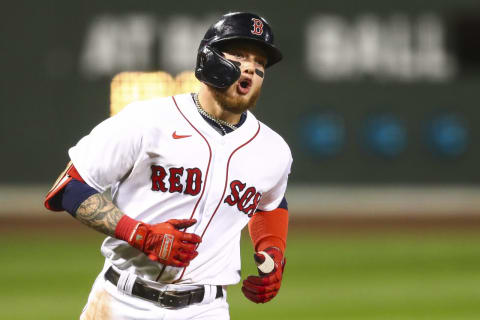 Alex Verdugo of the Boston Red Sox reacts to hitting a solo home run. (Photo by Adam Glanzman/Getty Images)