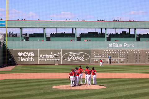 FORT MYERS, FLORIDA – MARCH 12: Hirokazu Sawamura #19 of the Boston Red Sox awaits to be pulled from the game after walking in a run in the fifth inning against the Tampa Bay Rays in a spring training game at JetBlue Park at Fenway South on March 12, 2021 in Fort Myers, Florida. (Photo by Mark Brown/Getty Images)