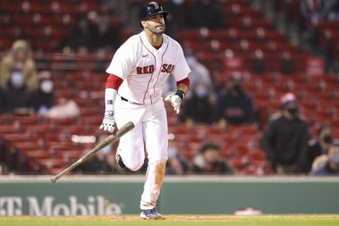 BOSTON, MA – APRIL 05: J.D. Martinez #28 of the Boston Red Sox hits a three-run home run in the eighth inning of a game against the Tampa Bay Rays at Fenway Park on April 5, 2021 in Boston, Massachusetts. (Photo by Adam Glanzman/Getty Images)