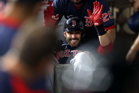 ARLINGTON, TEXAS – APRIL 30: J.D. Martinez #28 of the Boston Red Sox is pushed in a laundry cart after hitting a three-run homerun against the Texas Rangers in the first inning at Globe Life Field on April 30, 2021 in Arlington, Texas. (Photo by Ronald Martinez/Getty Images)