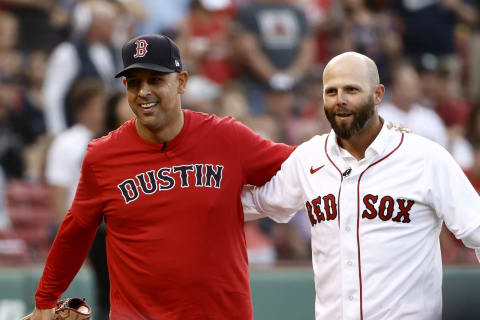 BOSTON, MA – JUNE 25: Former Boston Red Sox second baseman Dustin Pedroia and former teammate and current manager Alex Cora #13 of the Boston Red Sox before the game between the Boston Red Sox and the New York Yankees at Fenway Park on June 25, 2021 in Boston, Massachusetts. (Photo By Winslow Townson/Getty Images)