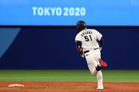 YOKOHAMA, JAPAN – AUGUST 02: Seiya Suzuki #51 of Team Japan rounds the bases after hitting a solo home run in the fifth inning against Team United States during the knockout stage of men’s baseball on day ten of the Tokyo 2020 Olympic Games at Yokohama Baseball Stadium on August 02, 2021 in Yokohama, Kanagawa, Japan. (Photo by Koji Watanabe/Getty Images)