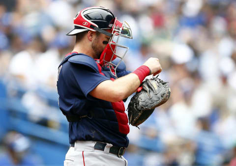 TORONTO, ON – AUGUST 08: Kevin Plawecki #25 of the Boston Red Sox signals a play during a MLB game against the Toronto Blue Jays at Rogers Centre on August 08, 2021 in Toronto, Canada. (Photo by Vaughn Ridley/Getty Images)