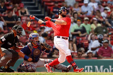 BOSTON, MA – AUGUST 23: Kyle Schwarber #18 of the Boston Red Sox follows through during the sixth inning against the Texas Rangers at Fenway Park on August 23, 2021 in Boston, Massachusetts. (Photo By Winslow Townson/Getty Images)