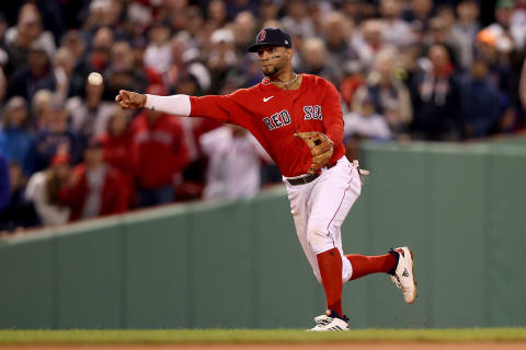 BOSTON, MASSACHUSETTS – OCTOBER 05: Xander Bogaerts #2 of the Boston Red Sox throws to force out Aaron Judge #99 of the New York Yankees during the eighth inning of the American League Wild Card game at Fenway Park on October 05, 2021 in Boston, Massachusetts. (Photo by Maddie Meyer/Getty Images)