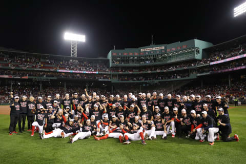 BOSTON, MASSACHUSETTS – OCTOBER 11: The Boston Red Sox celebrate their 6 to 5 win over the Tampa Bay Rays during Game 4 of the American League Division Series at Fenway Park on October 11, 2021 in Boston, Massachusetts. (Photo by Maddie Meyer/Getty Images)