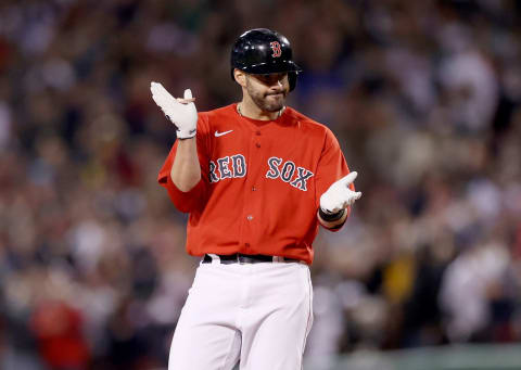 BOSTON, MASSACHUSETTS – OCTOBER 18: J.D. Martinez #28 of the Boston Red Sox celebrates his double against the Houston Astros during Game Three of the American League Championship Series at Fenway Park on October 18, 2021 in Boston, Massachusetts. (Photo by Elsa/Getty Images)