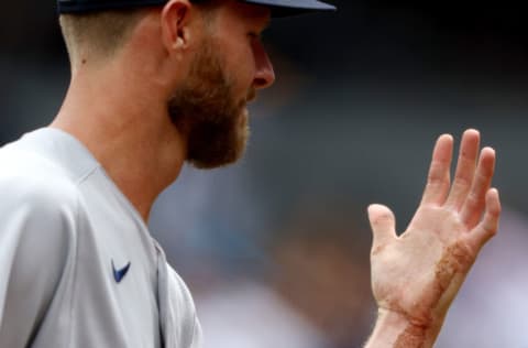 NEW YORK, NEW YORK - JULY 17: Chris Sale #41 of the Boston Red Sox leaves the field with a dislocated pinky finger after getting hit by a line drive from Aaron Hicks of the New York Yankees in the first inning at Yankee Stadium on July 17, 2022 in the Bronx borough of New York City. (Photo by Elsa/Getty Images)