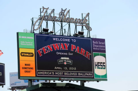 BOSTON, MA – APRIL 13: General view of the bleacher seats scoreboard before the game between the Boston Red Sox and the Tampa Bay Rays during the home opener on April 13, 2012 at Fenway Park in Boston, Massachusetts. (Photo by Elsa/Getty Images)